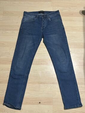 Kenneth Cole Men's Athletic Fit Jeans (30x32)